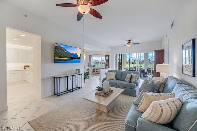 living room featuring light tile patterned flooring and ceiling fan