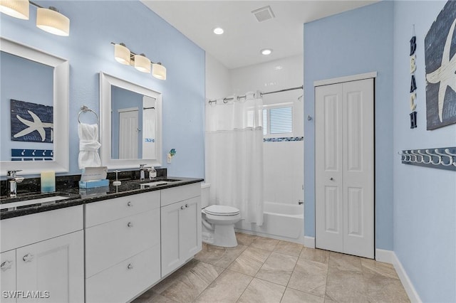 full bathroom featuring shower / bath combo, vanity, toilet, and tile patterned floors