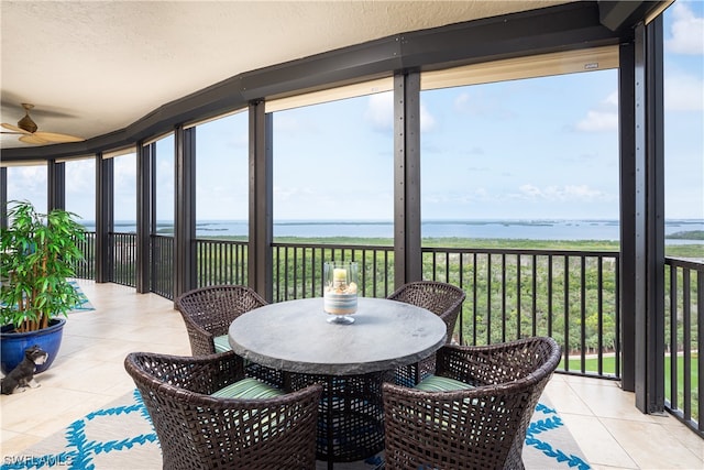 sunroom with a water view