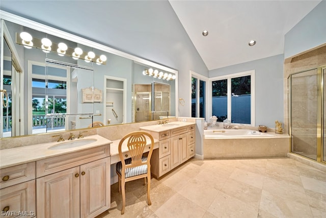 bathroom featuring dual bowl vanity, shower with separate bathtub, tile floors, and vaulted ceiling