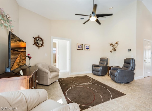 living room featuring high vaulted ceiling, ceiling fan, and light tile floors