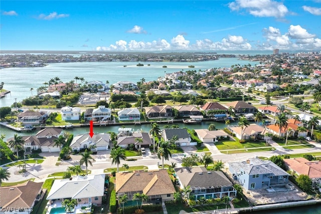 drone / aerial view featuring a water view