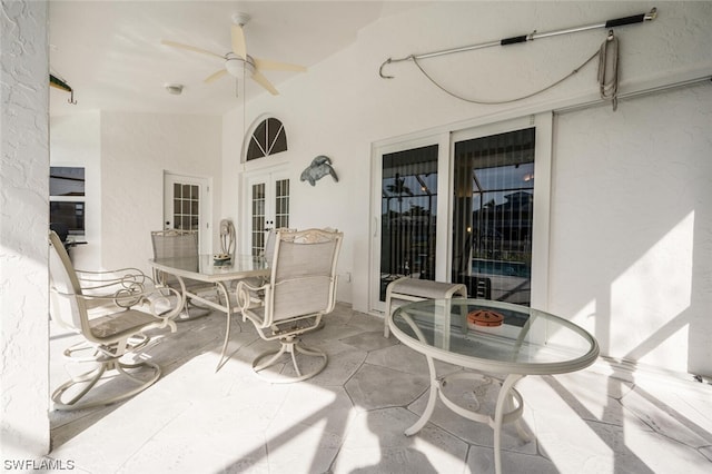 view of patio / terrace featuring french doors and ceiling fan