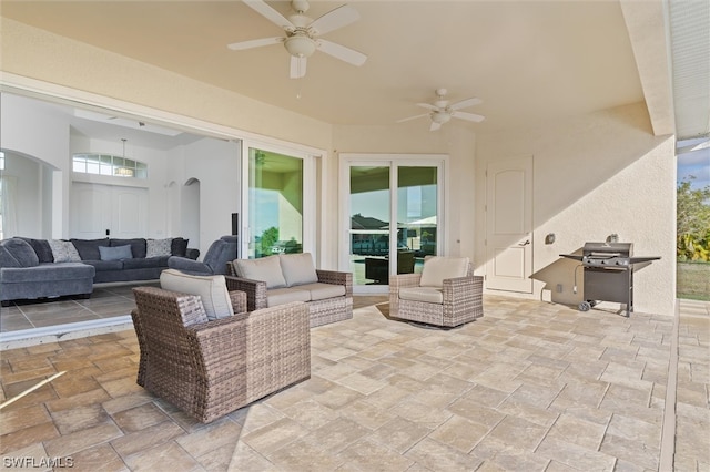 view of patio / terrace featuring ceiling fan and outdoor lounge area