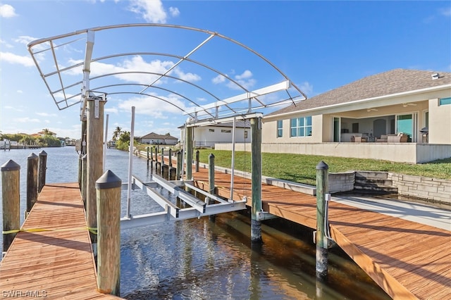 view of dock with a water view