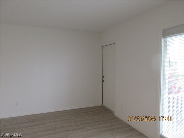 spare room featuring light hardwood / wood-style flooring