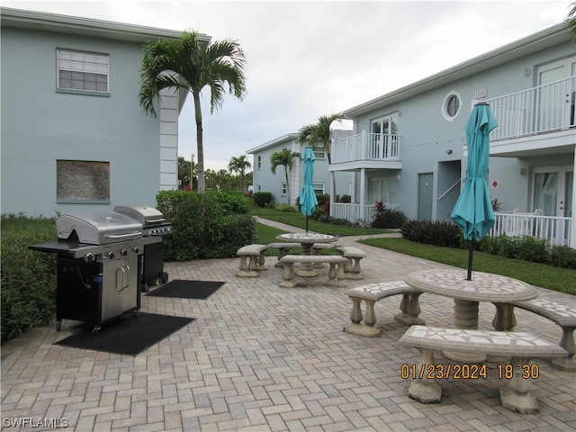 view of property's community with a patio area