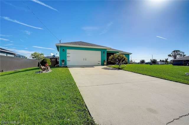 ranch-style house featuring a front yard and a garage