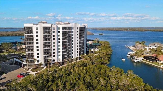 birds eye view of property featuring a water view