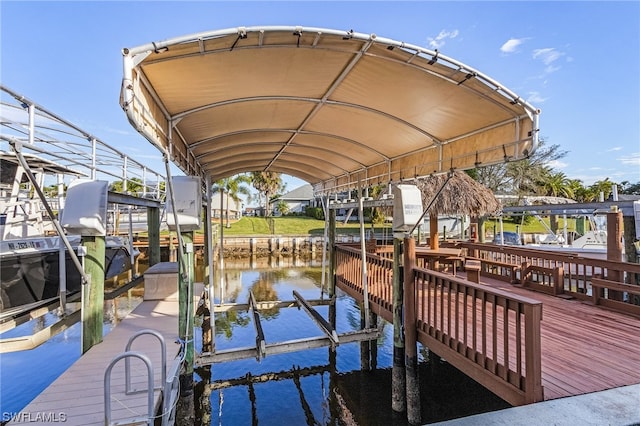 view of dock with a water view