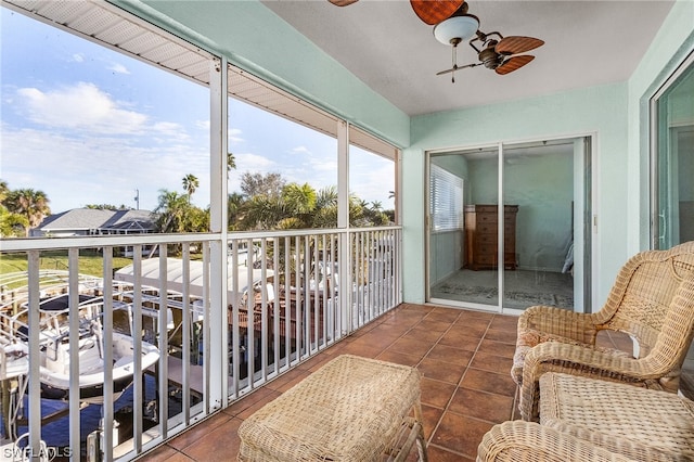 balcony featuring ceiling fan