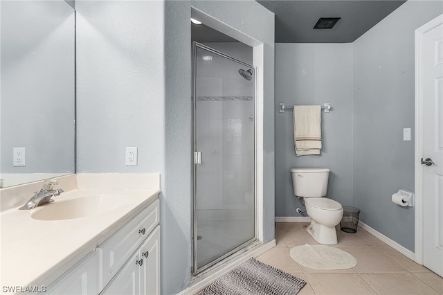 bathroom featuring walk in shower, toilet, large vanity, and tile flooring