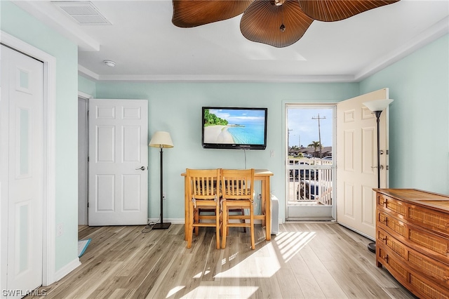 bedroom featuring ceiling fan and light hardwood / wood-style flooring