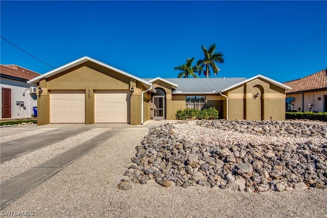 single story home with a garage