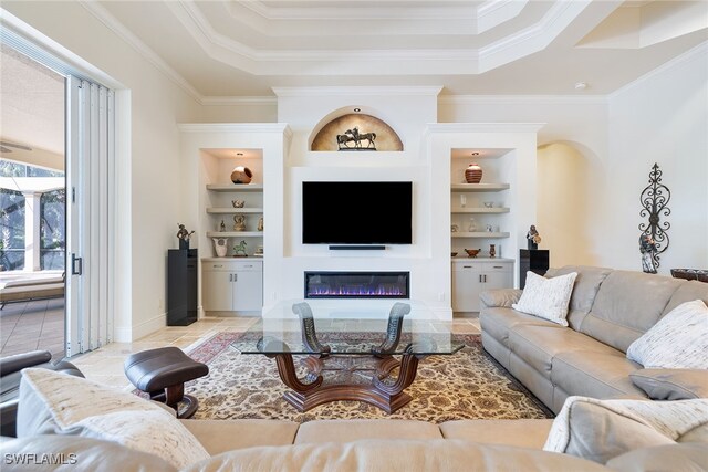 living room with built in shelves, light tile patterned flooring, and ornamental molding