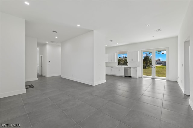 interior space with french doors and tile patterned floors