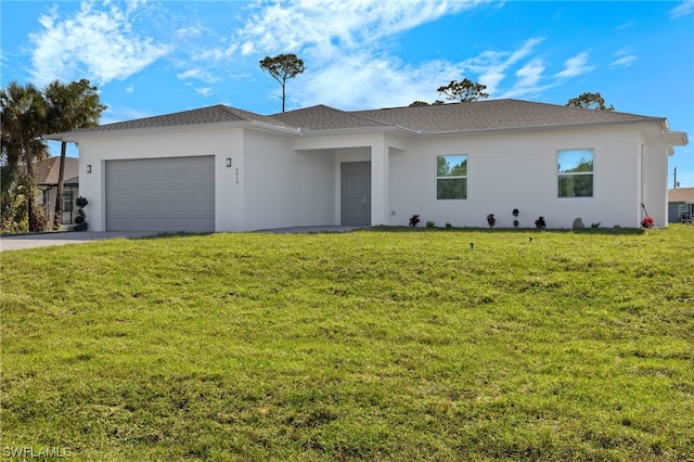 single story home with a garage and a front yard