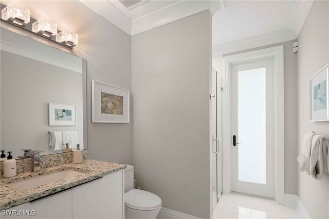 bathroom featuring tile patterned floors, vanity, and toilet