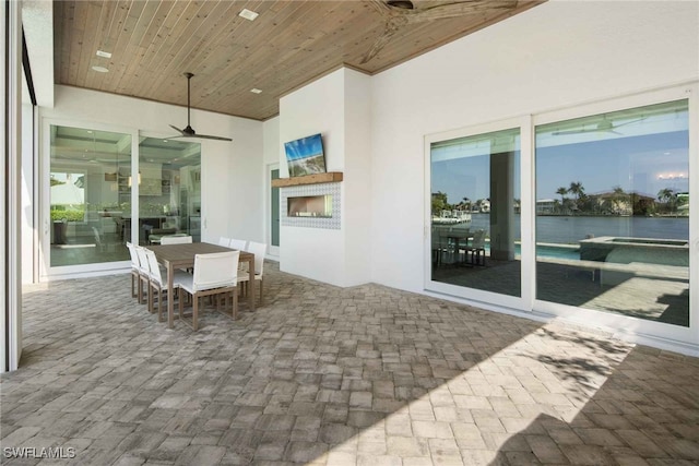 view of patio / terrace featuring ceiling fan