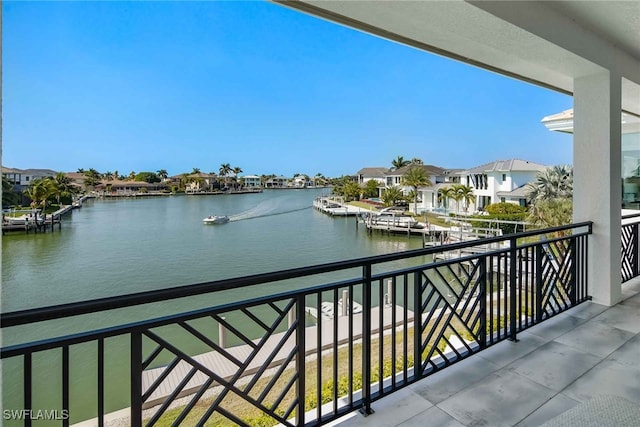 balcony featuring a water view