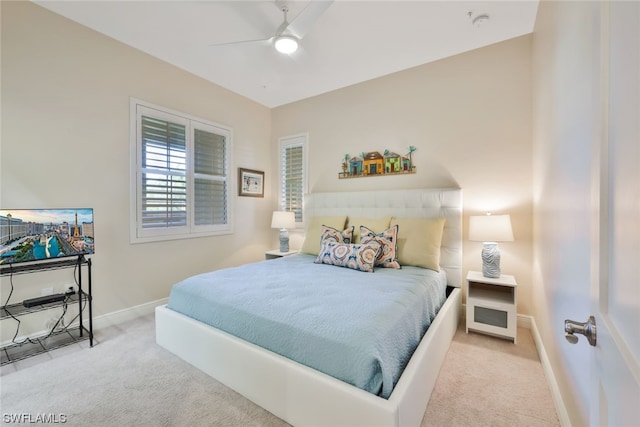 carpeted bedroom with ceiling fan