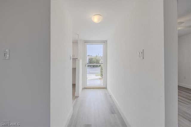 hall featuring light hardwood / wood-style flooring