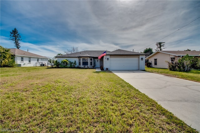 single story home featuring a front yard and a garage