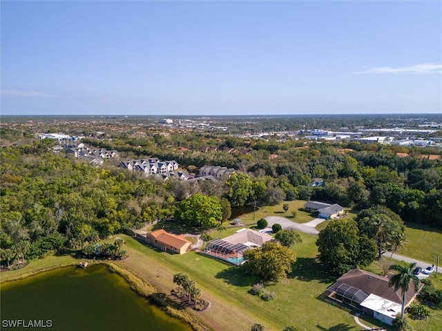 bird's eye view with a water view