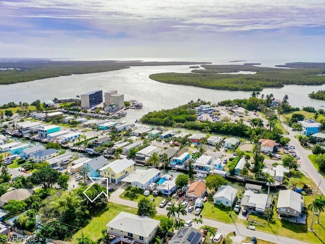 drone / aerial view featuring a water view