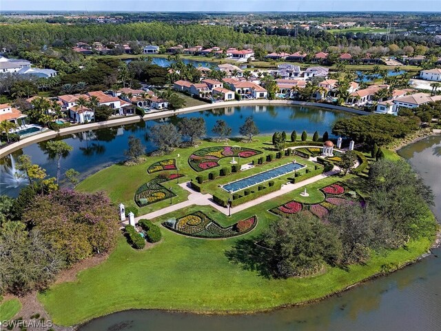 birds eye view of property featuring a water view