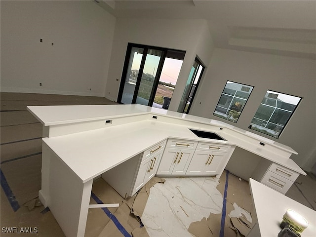 kitchen with white cabinetry