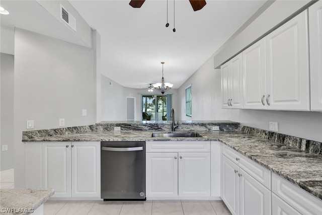 kitchen with pendant lighting, ceiling fan with notable chandelier, white cabinetry, dishwasher, and sink