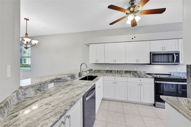 kitchen with white cabinetry, ceiling fan with notable chandelier, sink, and stainless steel appliances