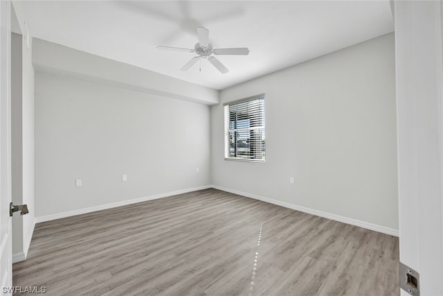 unfurnished room with light hardwood / wood-style floors and ceiling fan