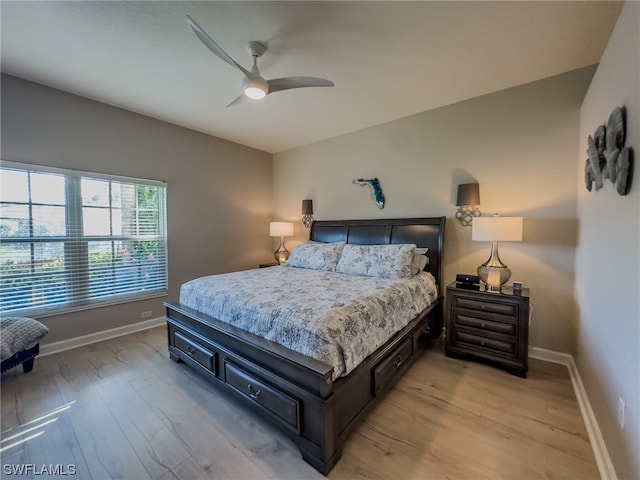 bedroom featuring ceiling fan and light wood-type flooring