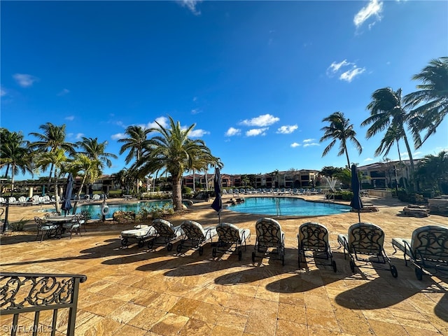 view of swimming pool featuring a patio area