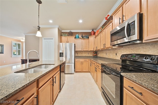 kitchen featuring light stone counters, ornamental molding, sink, black appliances, and decorative light fixtures