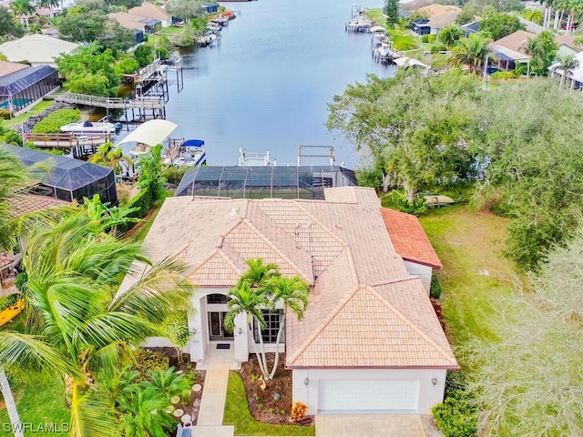 drone / aerial view with a water view