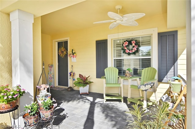 view of patio featuring ceiling fan