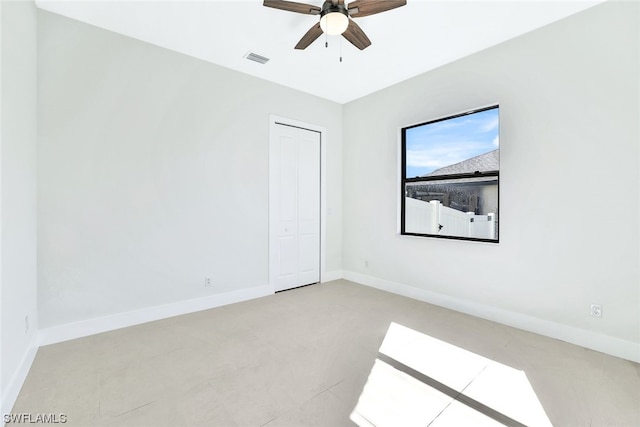 spare room featuring ceiling fan