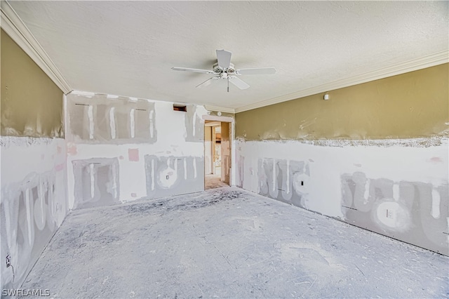 unfurnished room featuring ornamental molding, ceiling fan, and a textured ceiling