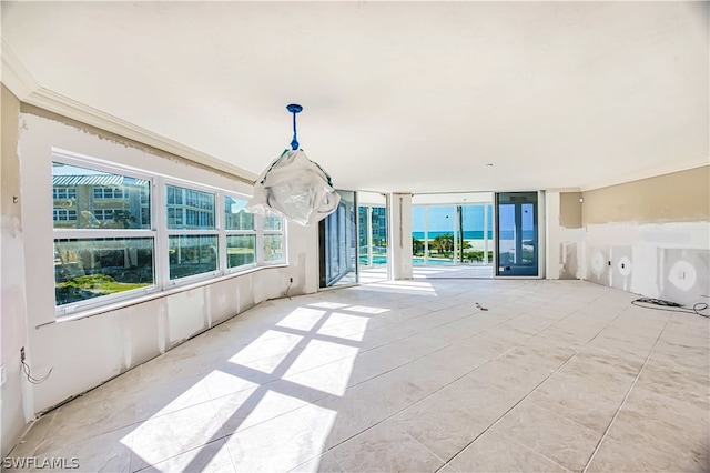 unfurnished living room with light tile floors