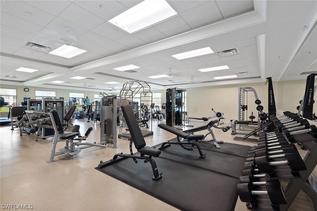 workout area featuring a paneled ceiling