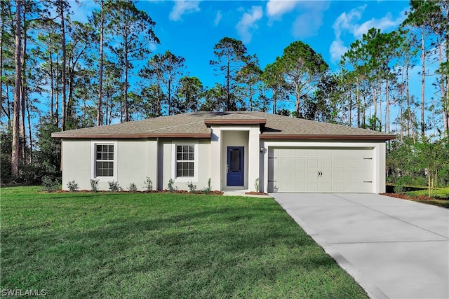 view of front facade with a front lawn and a garage