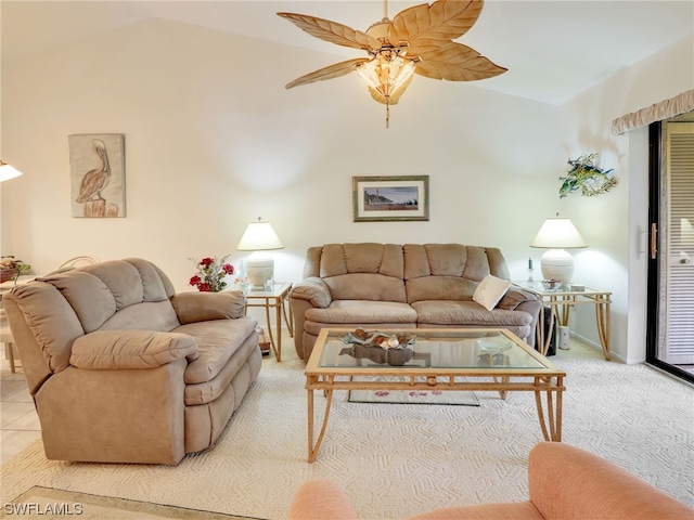 living room featuring vaulted ceiling, light colored carpet, and ceiling fan