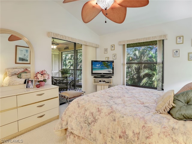 carpeted bedroom featuring ceiling fan, lofted ceiling, and access to exterior