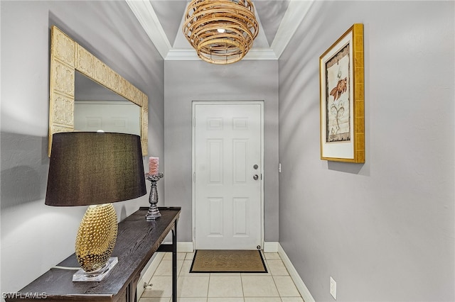 doorway with crown molding and light tile patterned flooring