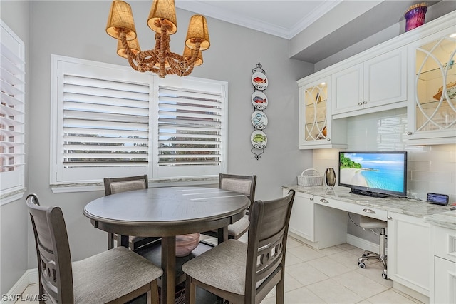 dining area featuring plenty of natural light, light tile patterned floors, a notable chandelier, and ornamental molding