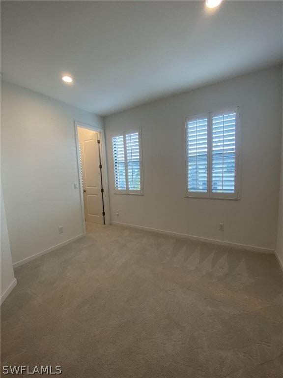 unfurnished room with carpet