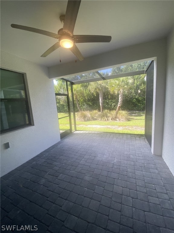 view of patio with ceiling fan